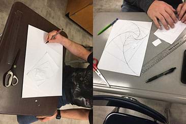 An image of students cutting out the sections and tracing the spirals.