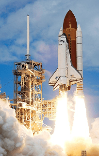 Photograph shows the take-off of a NASA rocket (space shuttle) beginning its launch to space.