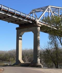 The concrete pier of a bridge crossing the Missouri River between Decatur, Nebraska and Monona County, Iowa.