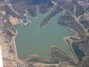 An aerial photo of the Happy Valley Reservoir in South Australia - a star-shaped body of inland water.