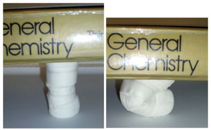 Two photos show a marshmallow column (left) at full height, and (right) broken and compressed under the weight of a book.