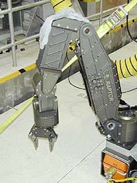 A picture of a robotic arm kit with five degrees of freedom.