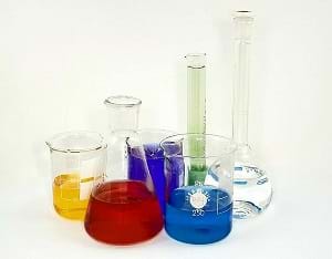 A graduated cylinder, a volumetric flask, an Erlenmeyer flask, and three beakers. 