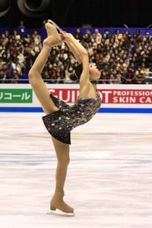 A professional figure skater performing a biellmann spin at the 2009 GPF.