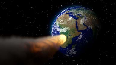 A fiery asteroid approaching planet Earth.