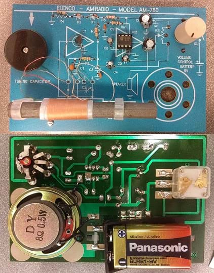 Photo shows all the parts of an assembled AM radio kit, including circuit boards,  battery and speaker.