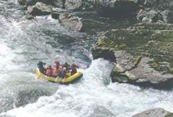 A photo of whitewater rafting on a river in Oregon.