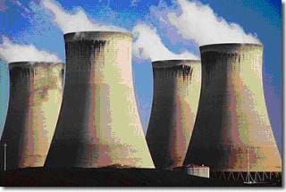 A photograph shows four concrete cooling towers.