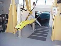 Photo shows what looks like a four-foot long missle painted to look like a yellow shark.