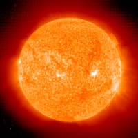 An image of the fiery hot sun. Specifically, a SOHO extreme ultraviolet imaging telescope (EIT) full-field He II 304 Å.