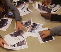 A photograph shows students at a table sorting images in order of the events at Chernobyl using context clues from the images and captions.