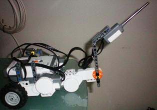 Photo shows a LEGO NXT robot with a temperature sensor attached.