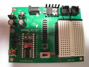 Photo shows a circuit board with a BS2 in the lower left side of the board.