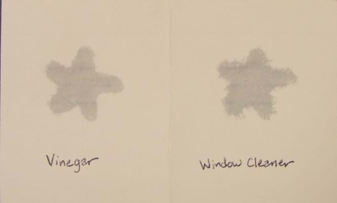 Two hand-drawn wet star shapes, one labeled vinegar, one labeled window cleaner.