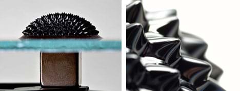 Two photos: Side view shows a glass plate on a cube-shaped magnet. On the glass, a domed and spiked shiny black material. And, a close-up of the spikes. 