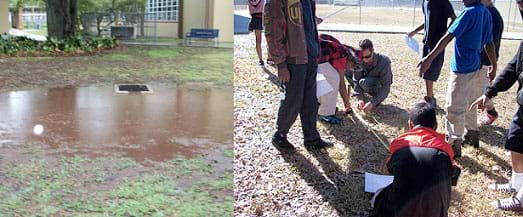 Two photographs: A low-lying muddy and wet grassy area near a school building with a curbed drain and grate in its middle region. Eight students and a teacher use a tape measure and write down dimensions and notes as they survey a potential area for a rain garden in East Tampa, FL.