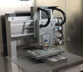 A photograph shows a regenHU 3D bioprinter inside a metal and glass printing area.