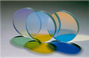Optically transparent materials creating dichroic filters.