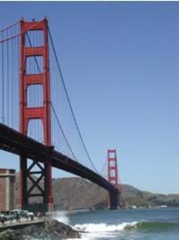 Photo shows cable bridge with two tall supports.