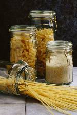 Photo shows jars of dry pasta, including spaghetti.