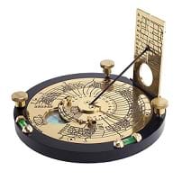 An engraved brass horizontal sundial that corrects for latitude, time zone, daylight savings time, longitude, and equation of time.