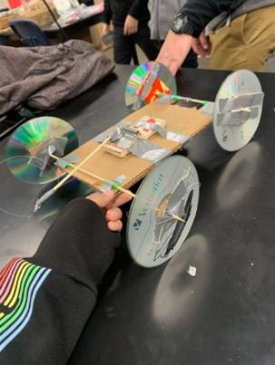 Student-designed examples of the Mouse Trap Car Design Challenge activity.