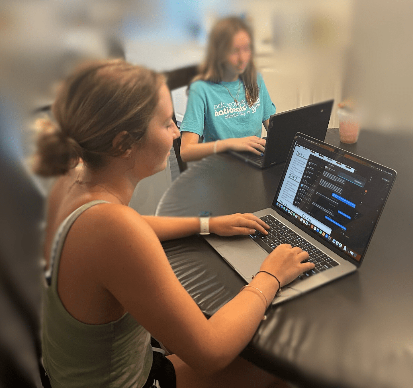 A photo of two students working through the Copilot worksheet.