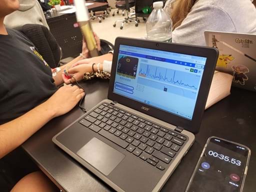 A photo showing a student collecting data during the experiment. A photo showing a student collecting data during the experiment.