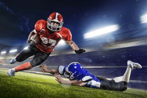 A photo of a football player using his velocity to evade an opposing player, showing how science and sports can intersect. 