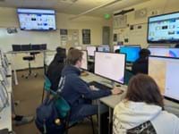 A photo of students working at their lab computers. A photo of students working at their lab computers.